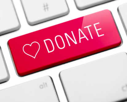 A keyboard with one of the buttons saying donate