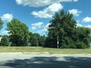Modern image of the area of 1837 N 24 St. Grassy area with trees