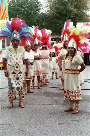 Fiesta-goers in traditional dress