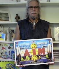 Donel Keeler holds his painting