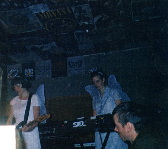 Jenn Walker (keyboards) and Jamie Presnall (guitar) perform at the Cog Factory with their band Park Ave.