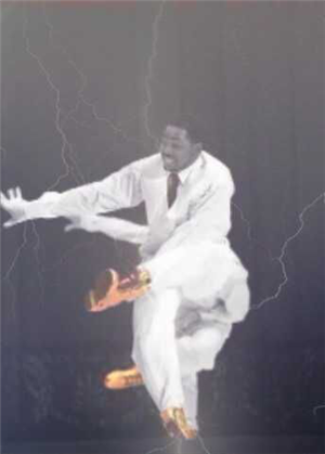 James Mason performs on stage