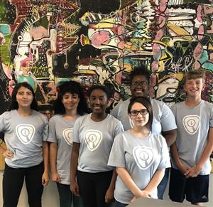 Group photo of students working on the project